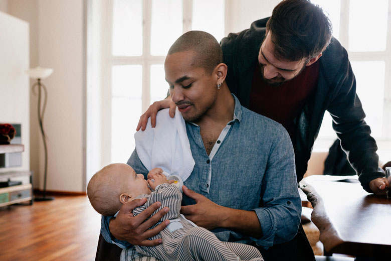 Two Fathers with Baby